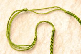 Kordel Halskette mit Muranoglas Parfumfläschchen Anhänger in grün